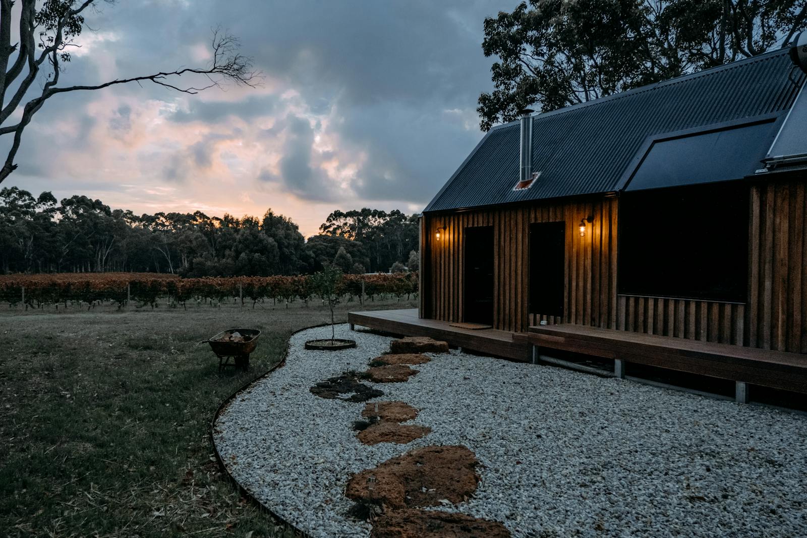 Home exterior with custom wood siding and outdoor living space